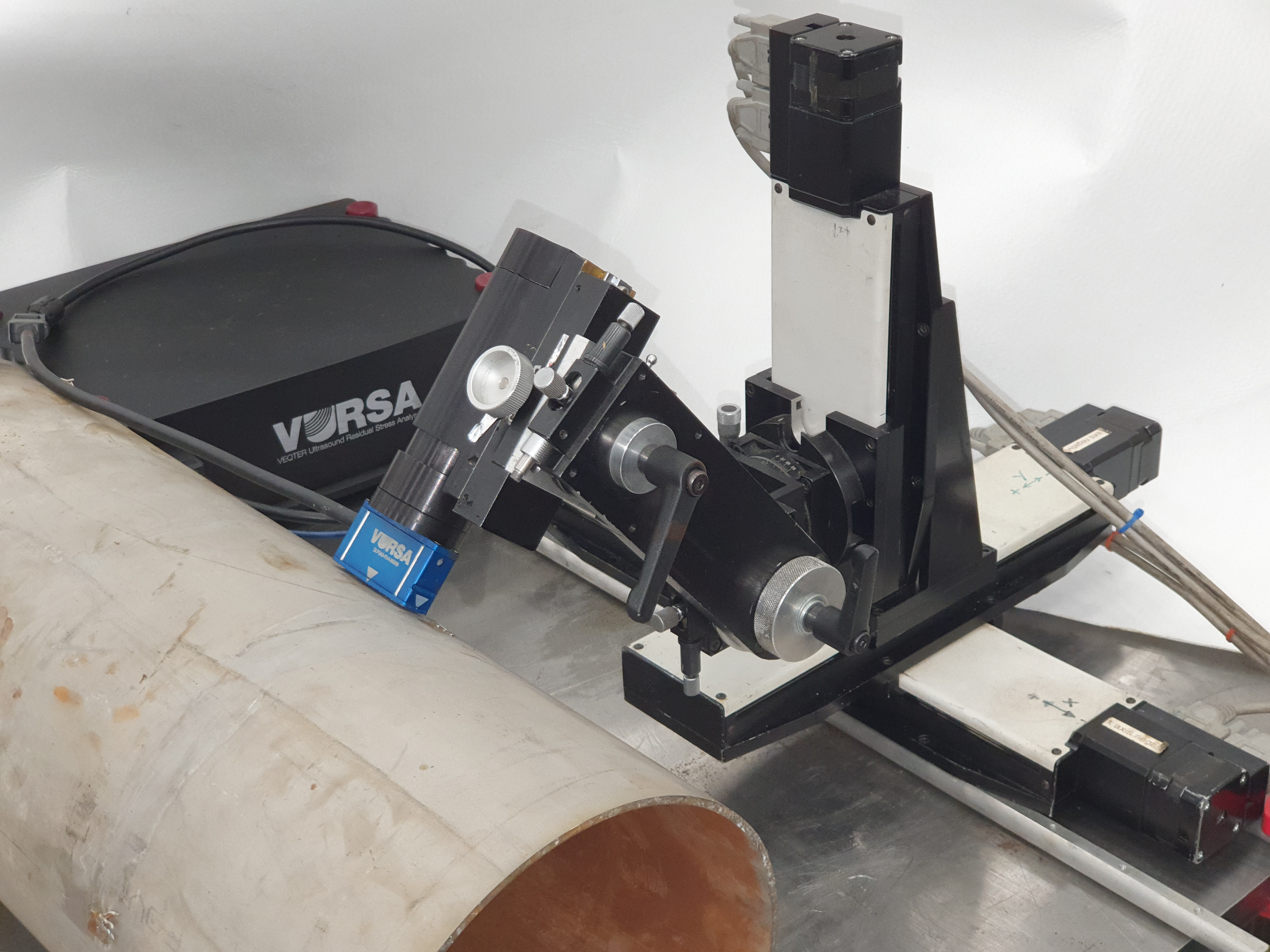 Residual stress mapping measurement of a 4-point, plastically bent beam using an XYZ table